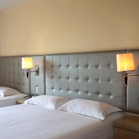 Qingdao Renjia Bussiness Hotel ภายนอก รูปภาพ