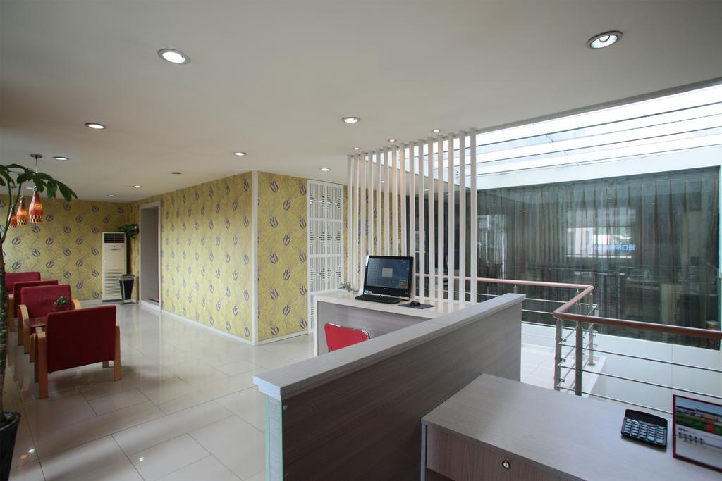 Qingdao Renjia Bussiness Hotel ภายนอก รูปภาพ