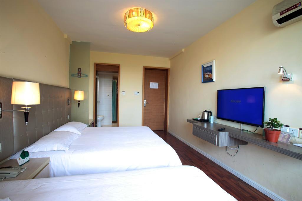 Qingdao Renjia Bussiness Hotel ภายนอก รูปภาพ