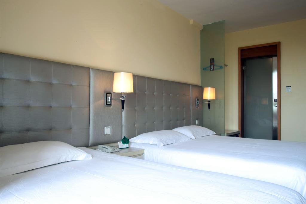 Qingdao Renjia Bussiness Hotel ภายนอก รูปภาพ
