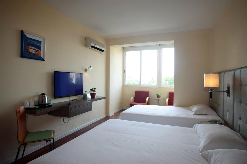Qingdao Renjia Bussiness Hotel ภายนอก รูปภาพ
