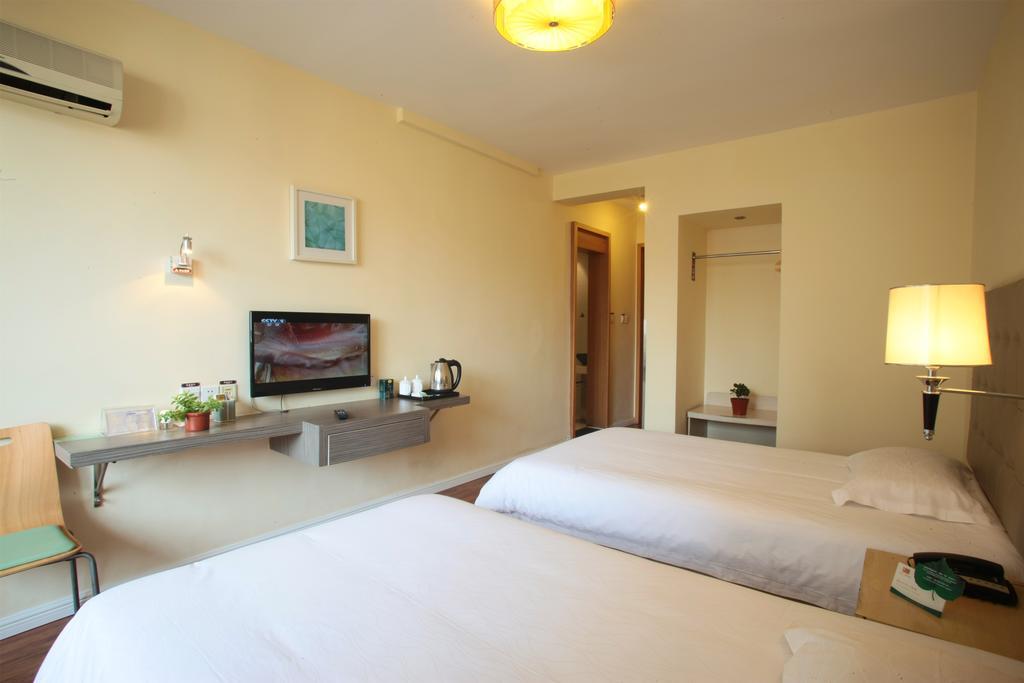 Qingdao Renjia Bussiness Hotel ภายนอก รูปภาพ