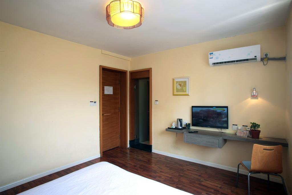 Qingdao Renjia Bussiness Hotel ภายนอก รูปภาพ