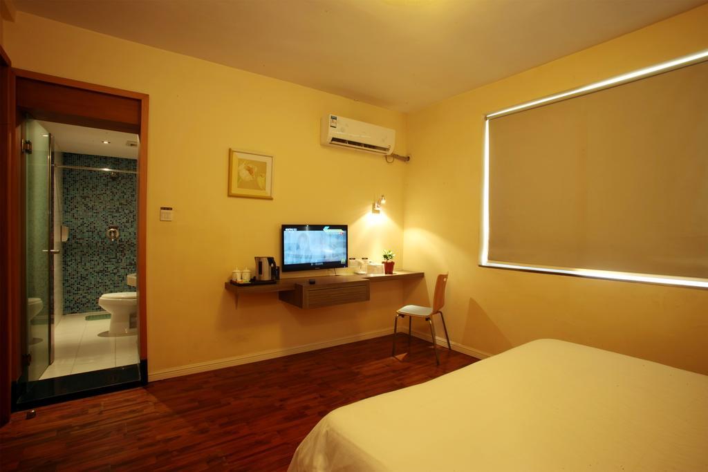 Qingdao Renjia Bussiness Hotel ภายนอก รูปภาพ